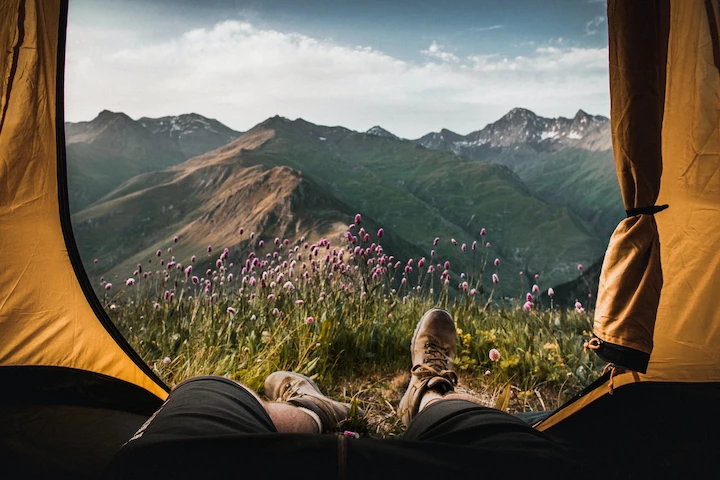 Relaxing inside a tent with a great view